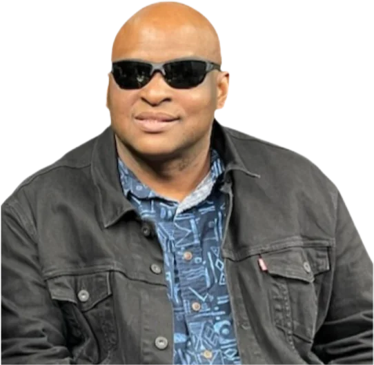 Vinn smiling in a denim jacket and sunglasses